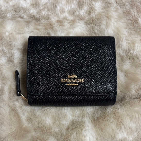 Coach Handbags - Coach Black Textured Leather Tri-Fold Wallet with Gold Logo